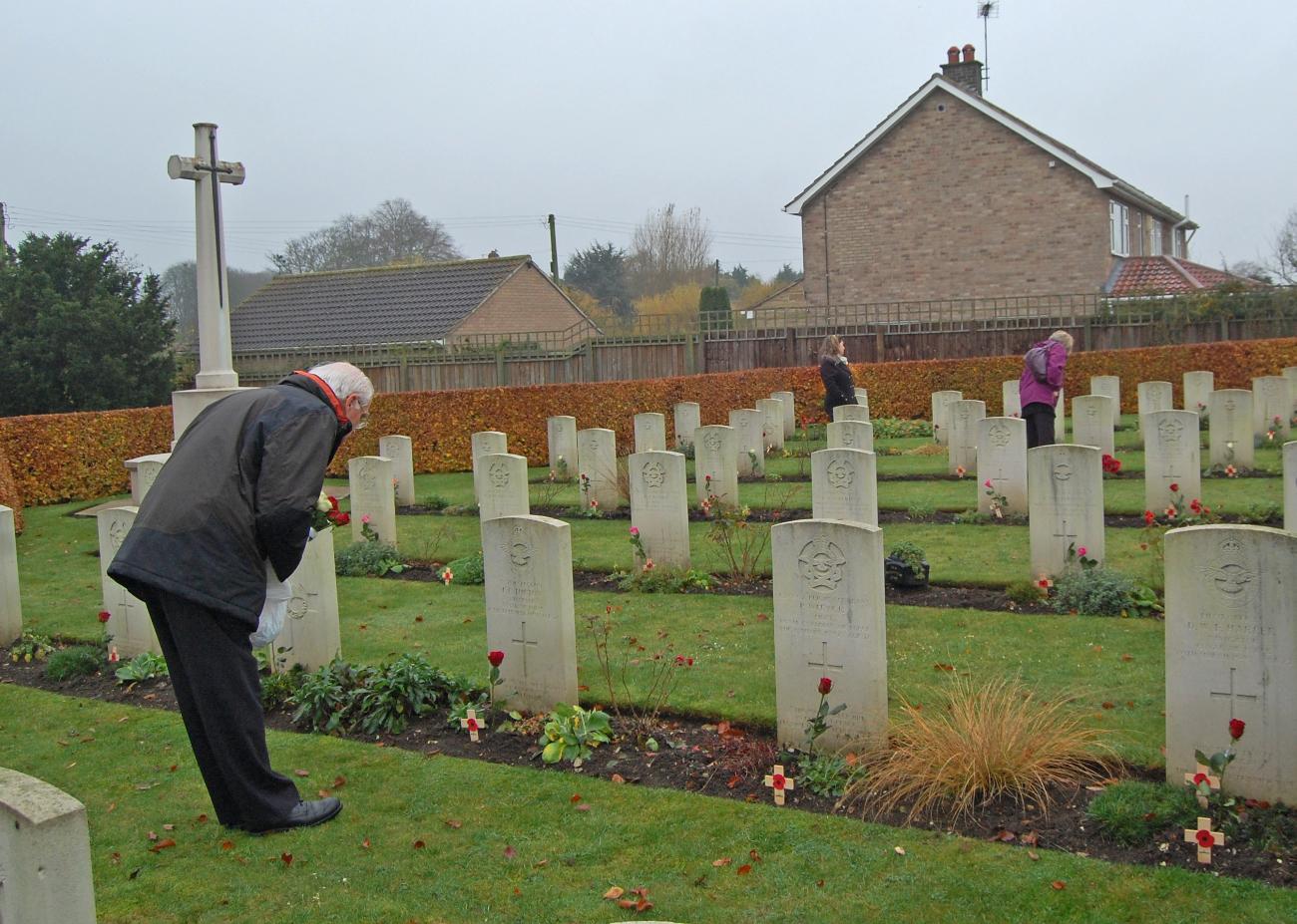 Laying out roses at St. Catherines, Barmby Moor on Rem Sunday 2011 - 102 Ceylon Squadron